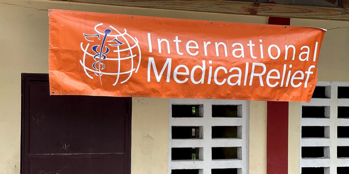 IMR banner outside clinic in Haiti